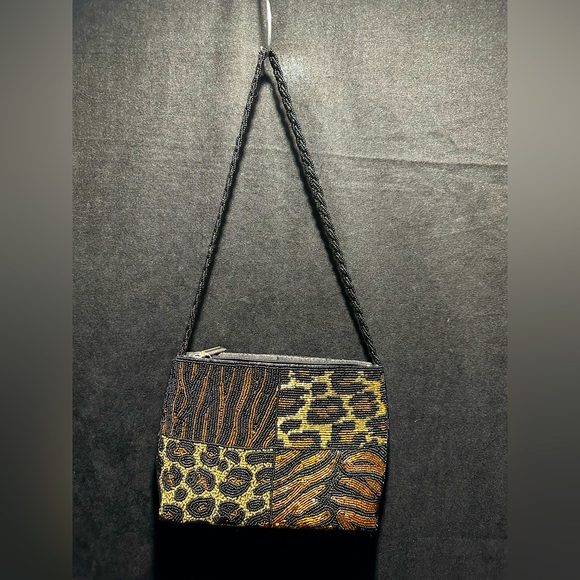 Unbranded beautiful beaded handbag in multi animal print...